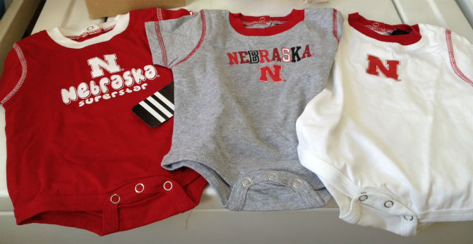 husker onesies: the first thing our child will wear